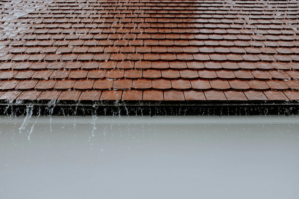 What to Do When Your Roof Is Leaking: A DIY Damage Control Guide
